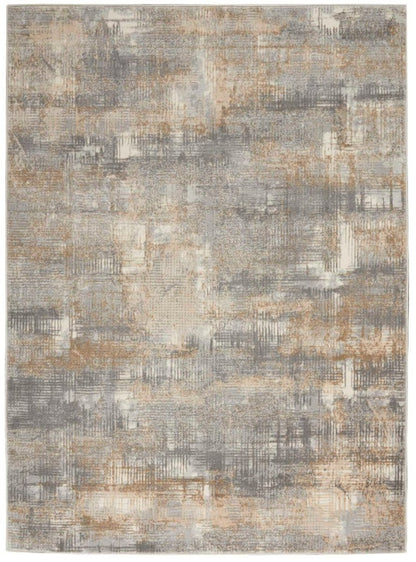 The Calvin Klein Rush Rug Collection featuring a modern grey and beige pattern for a luxurious home decor