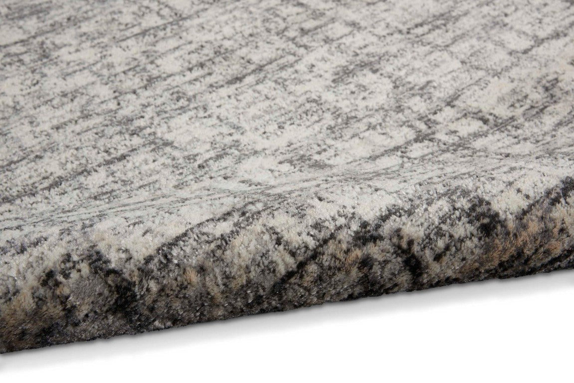 Luxury Nourison rug from The Calvin Klein Rush Rug Collection with modern grey and beige pattern