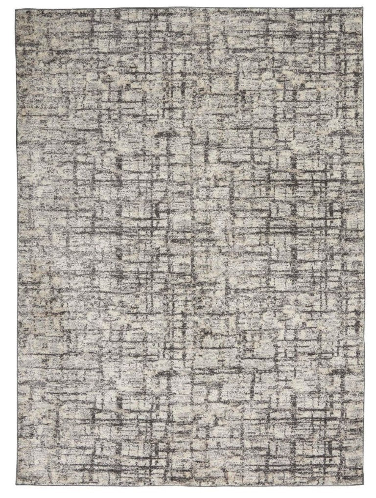 Luxury rug from The Calvin Klein Rush Rug Collection featuring a modern abstract design in grey tones
