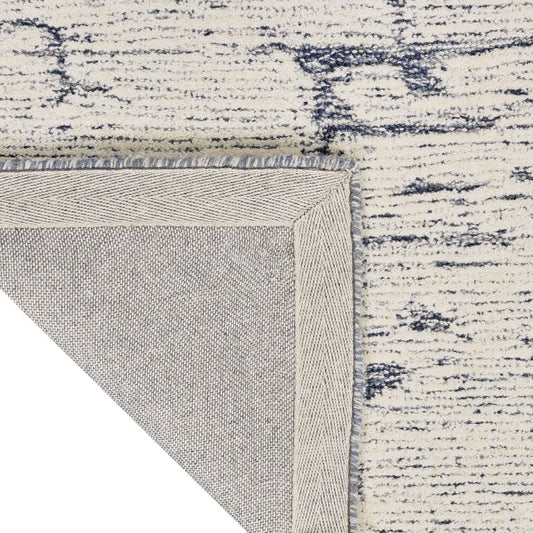Close-up of the Calvin Klein Sculptural Rug Collection featuring a textured design and elegant finish