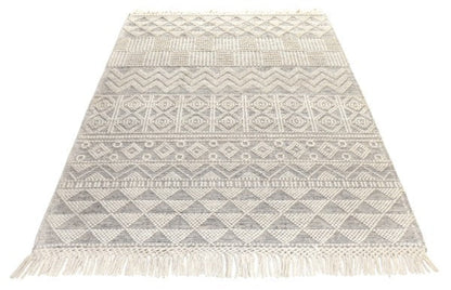 Concept Looms Anya Rug luxury rug with intricate geometric patterns and fringed edges in neutral tones