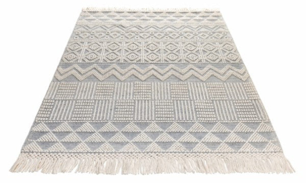 Concept Looms Anya Rug luxury woven rug with geometric patterns and fringed edges in neutral tones