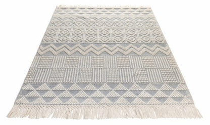 Concept Looms Anya Rug luxury woven rug with geometric patterns and fringed edges in neutral tones