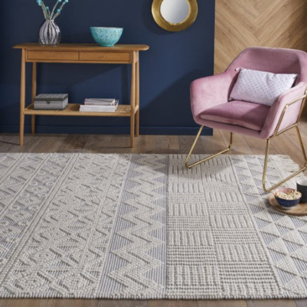 Concept Looms Anya Rug luxury rug with textured geometric patterns in a modern living room setting
