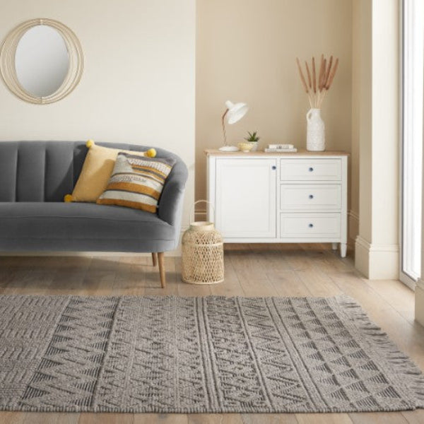 Concept Looms Anya Rug in grey with geometric patterns in a modern living room setting