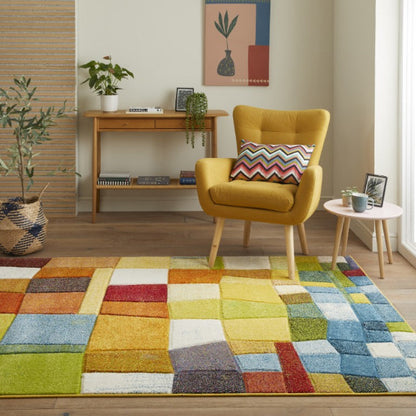 Concept Looms Viva Rug luxury multicolour patchwork design in stylish living room with yellow armchair