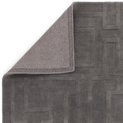 Luxury grey Contemporary Plains Collection Maze Rug by Asiatic with textured maze pattern and folded corner
