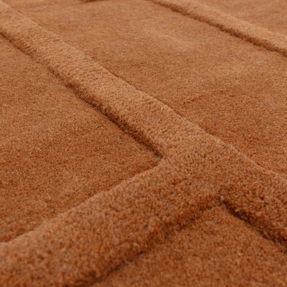 Close-up of Asiatic Contemporary Plains Collection Maze Rug showing soft textured brown geometric pattern