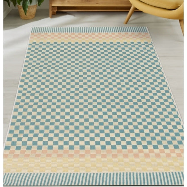 Cosmos Chequer Pastel Outdoor Rug with a stylish checkered pattern in soft pastel colours