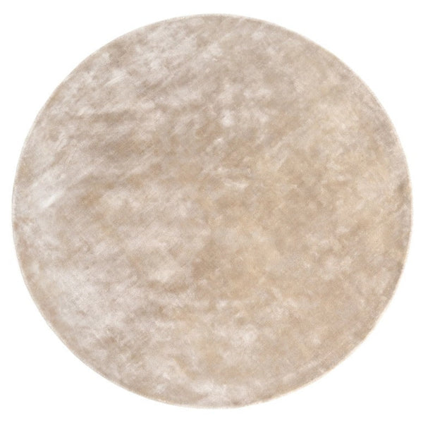 Round beige rug on a white background