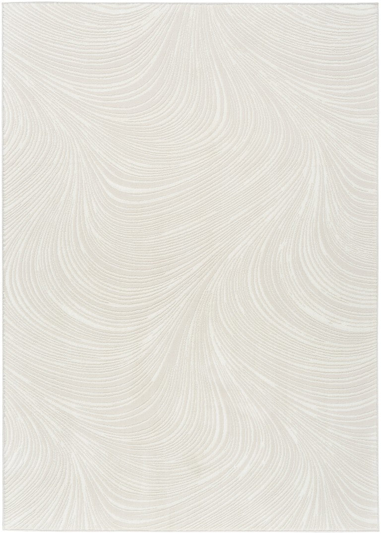 Elegant cream Nourison luxury rug from The DKNY Central Park West Rug Collection with a wavy pattern