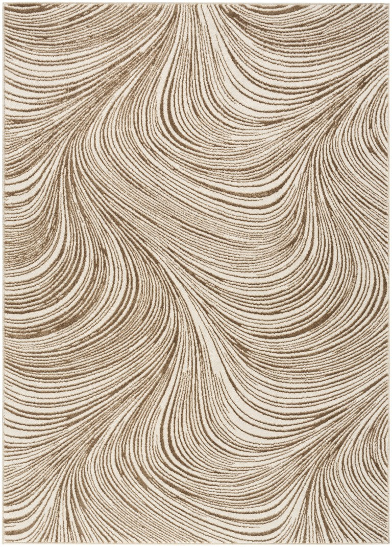 Luxury beige Nourison rug from The DKNY Central Park West Rug Collection with elegant swirling patterns