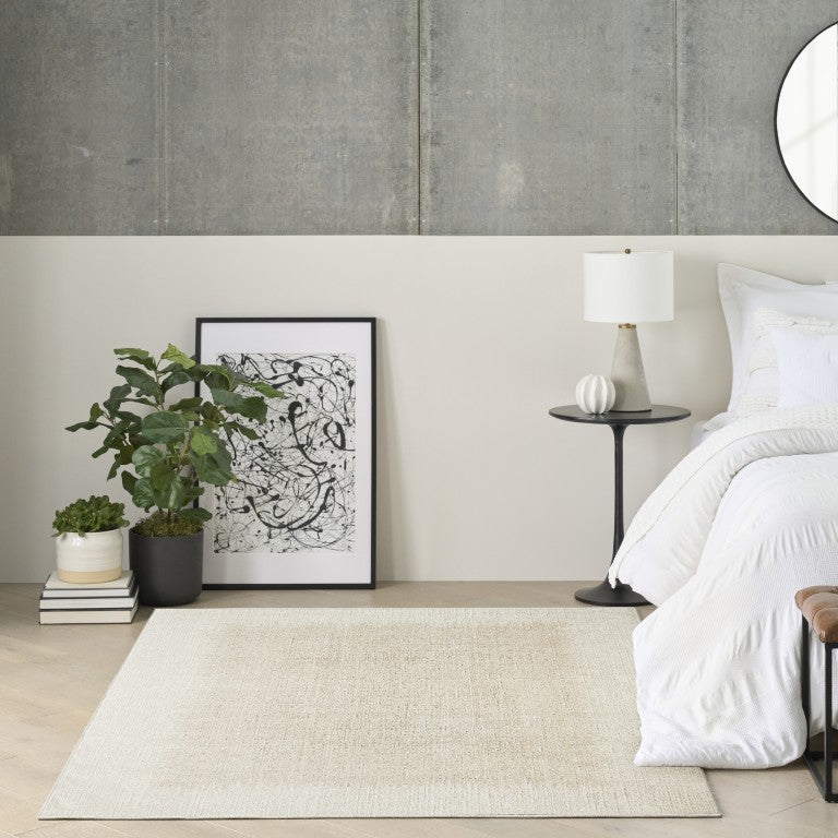 Nourison DKNY Grand Street Rug Collection in a minimalist living space with neutral tones