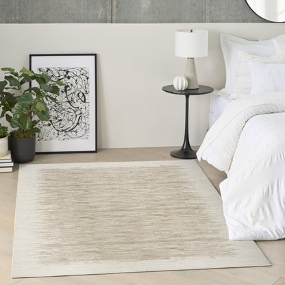 The DKNY Grand Street Rug Collection in a stylish living space with neutral tones and modern decor
