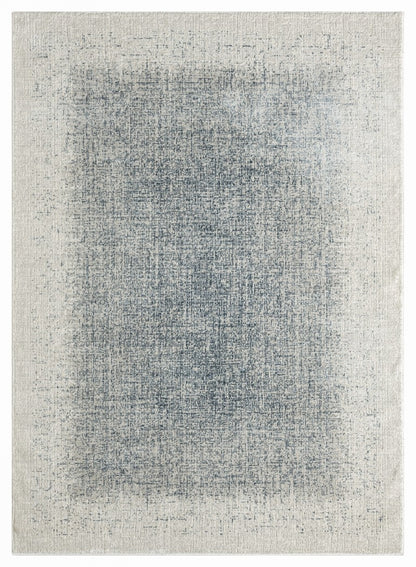 The DKNY Grand Street Rug Collection featuring a subtle blue and cream abstract design