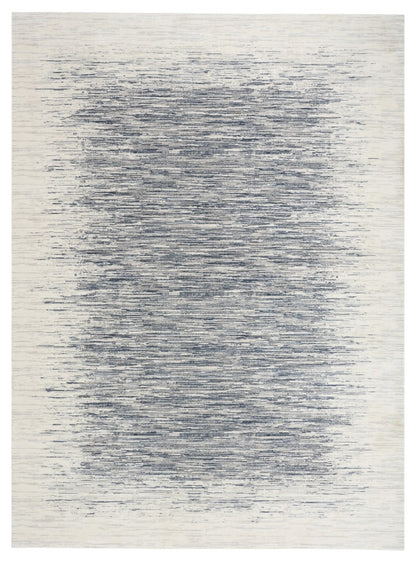 The DKNY Grand Street Rug Collection in elegant grey and cream tones, perfect for luxury home décor