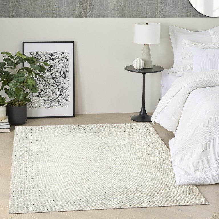 Nourison Luxury Rug from The DKNY Grand Street Rug Collection in a modern bedroom setting