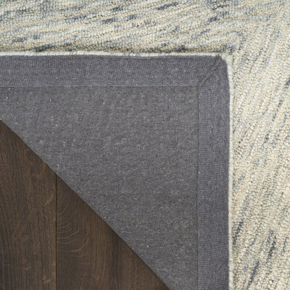 Detail of The DKNY Pure Angles Rug Collection showcasing a textured weave and stylish edge design