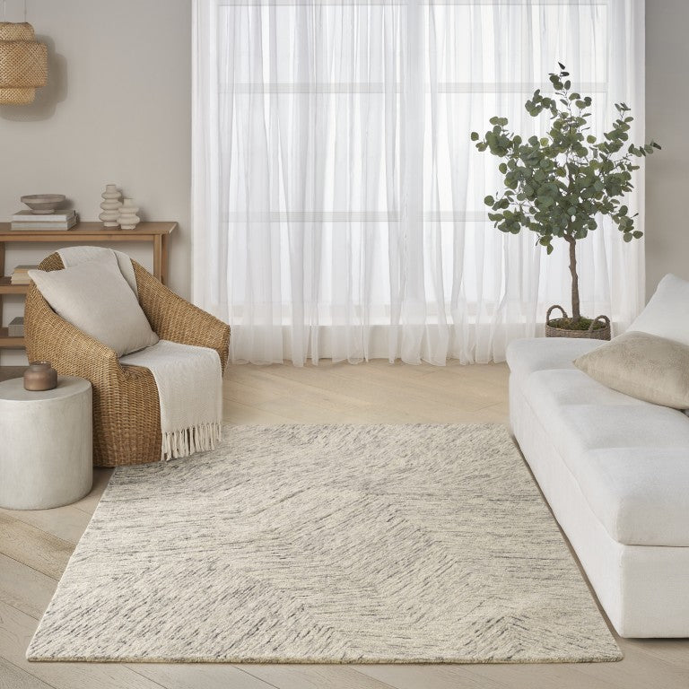 Elegant living room featuring The DKNY Pure Angles Rug Collection enhancing a cosy atmosphere