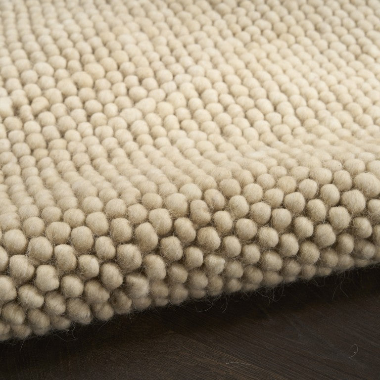 Textured beige Luxury Rug from The DKNY Pure Knots Rug Collection, perfect for modern décor