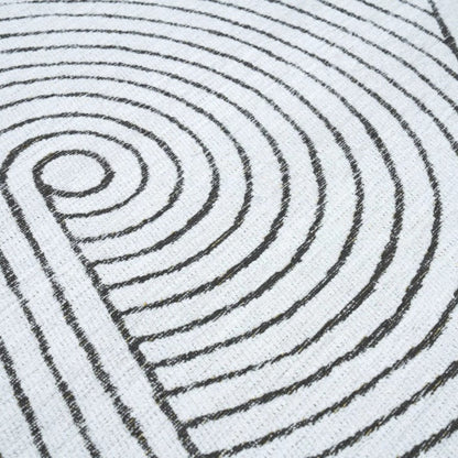 Close-up of concentric circular patterns on a textured surface