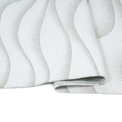 Close-up of a textured white surface with wavy patterns