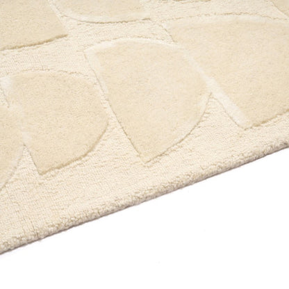 Close-up of a textured rug mat on a white background