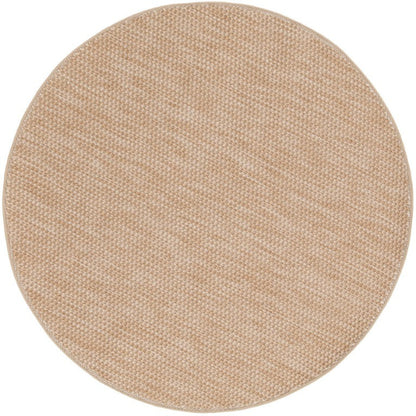 Round beige rug on a white background