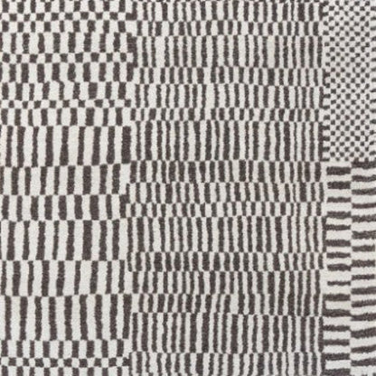 Louis De Poortere Berber Rug luxury design with intricate black and white geometric patterns