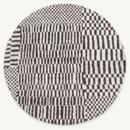 Round Louis De Poortere Berber Rug with black and white geometric checkered pattern