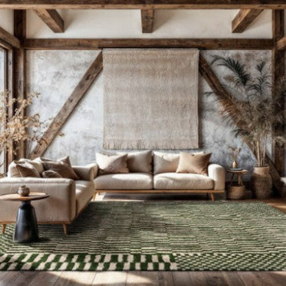 Living room featuring Louis De Poortere Berber Rug with green geometric pattern and neutral modern sofas