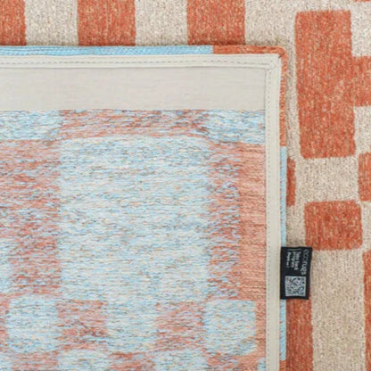 Close-up of Louis De Poortere Chess rug showing corner detail and intricate woven pattern