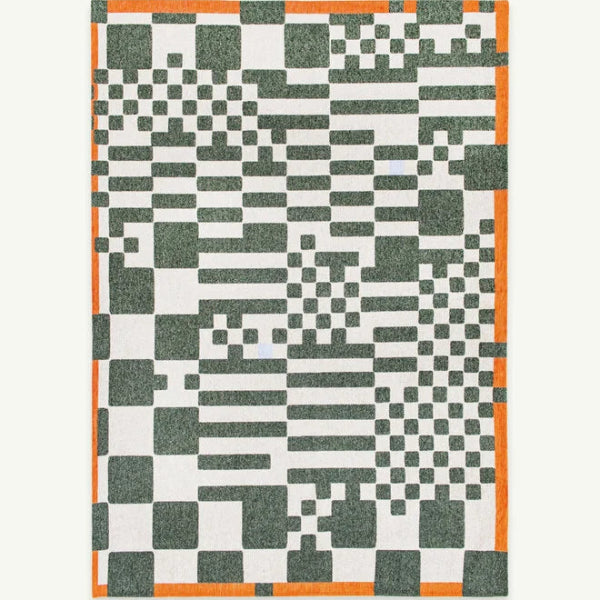 Louis De Poortere Chess rug featuring geometric black and white patterns with orange border luxury rug