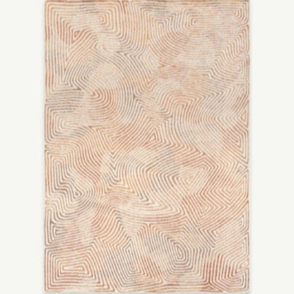 Louis De Poortere Coral rug with intricate geometric pattern in soft coral and beige tones luxury floor decor