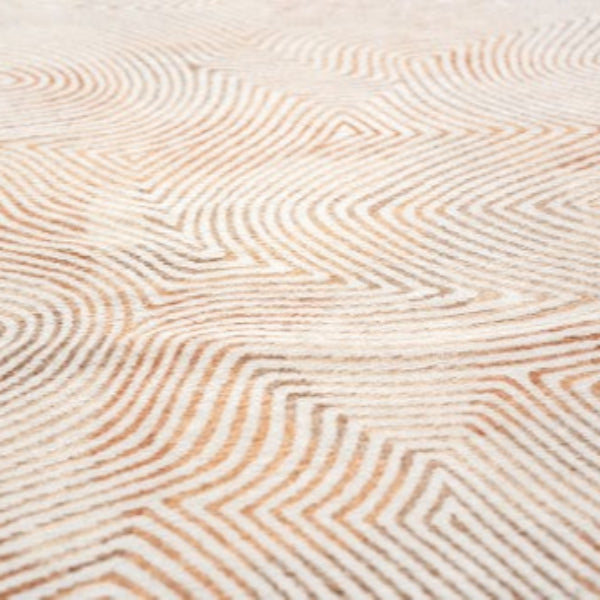 Close-up of Louis De Poortere Coral rug showcasing luxury texture with coral and white geometric pattern