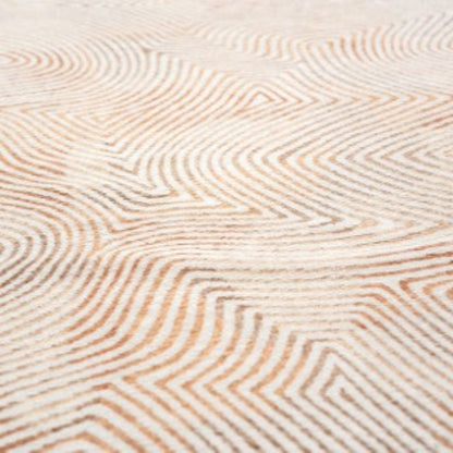 Close-up of Louis De Poortere Coral rug showcasing luxury texture with coral and white geometric pattern