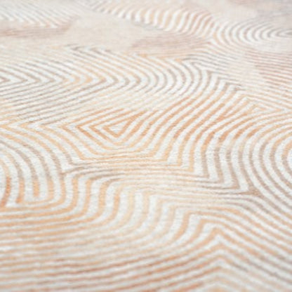 Close-up of Louis De Poortere Coral rug with intricate coral and beige wave pattern luxury design