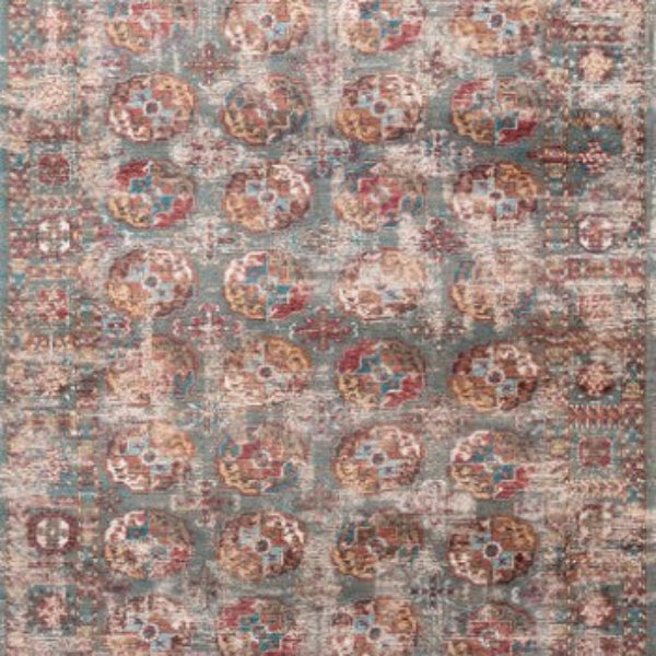 Louis De Poortere Kasak rug with intricate traditional patterns in muted blue, red, and beige tones