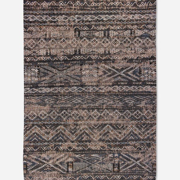 Brown and beige Louis De Poortere kilim rug with intricate geometric patterns and luxury texture