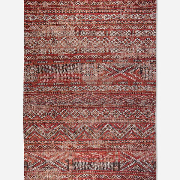 Louis De Poortere kilim rug in red tones with intricate geometric patterns and a vintage finish