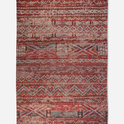 Louis De Poortere kilim rug in red tones with intricate geometric patterns and a vintage finish