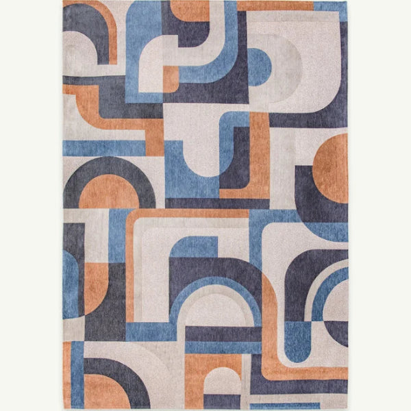 Louis De Poortere Module rug featuring a luxury geometric pattern in blue, beige, and orange tones