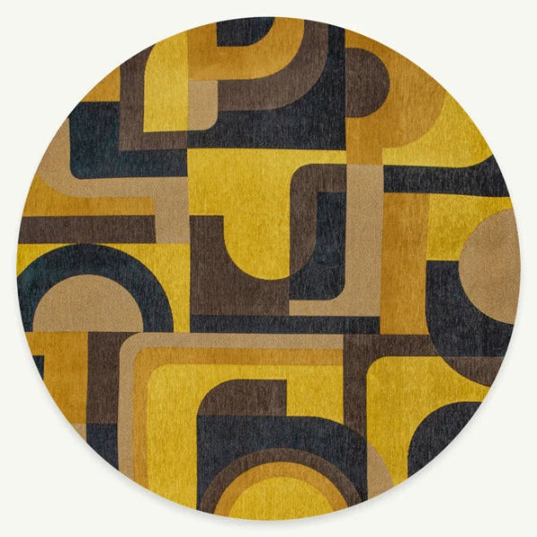 Round Louis De Poortere Module rug with geometric pattern in mustard yellow brown and black tones