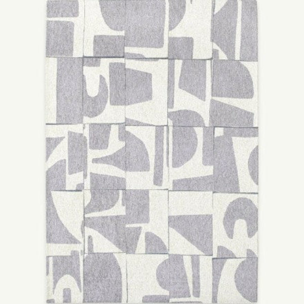 Louis De Poortere Papercut rug luxury design with grey abstract shapes on white background