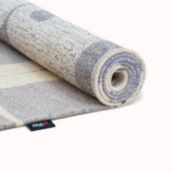 Louis De Poortere Papercut rug with abstract orange and white geometric pattern luxury rug  