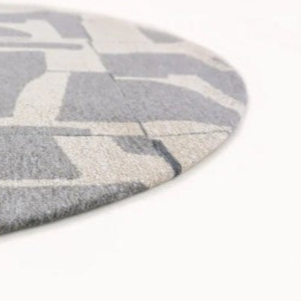 Louis De Poortere Papercut rug with abstract orange and white geometric pattern luxury rug    