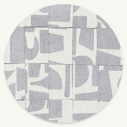 Louis De Poortere Papercut rug with abstract orange and white geometric pattern luxury rug 