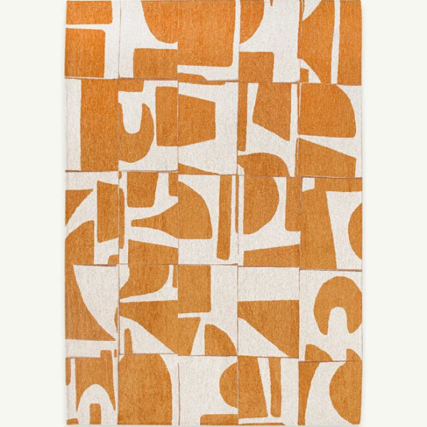Louis De Poortere Papercut rug with abstract orange and white geometric pattern luxury rug