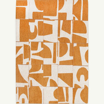 Louis De Poortere Papercut rug with abstract orange and white geometric pattern luxury rug