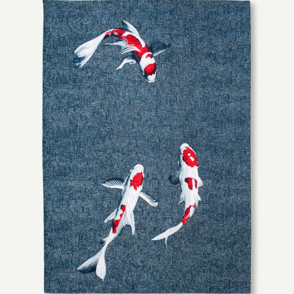 Louis De Poortere Pop rug featuring a luxury design with three red and white koi fish on a blue background